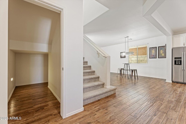 10417 W Alyssa Ln, Peoria, AZ 85383 - entrance foyer featuring baseboards, wood finished floors, and stairs