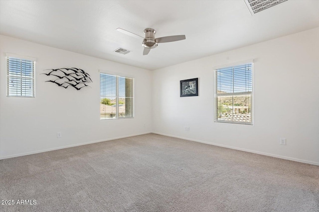 10417 W Alyssa Ln, Peoria, AZ 85383 - carpeted spare room featuring visible vents, a ceiling fan, and a healthy amount of sunlight