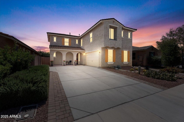 10417 W Alyssa Ln, Peoria, AZ 85383 - view of front of property with driveway, a tiled roof, fence, and stucco siding