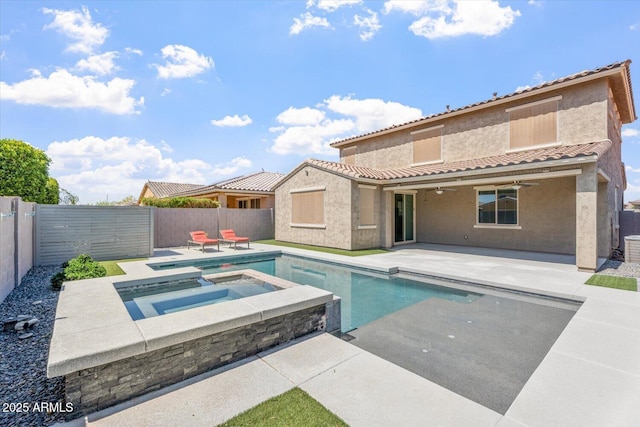 10417 W Alyssa Ln, Peoria, AZ 85383 - view of swimming pool with a patio area, a pool with connected hot tub, a fenced backyard, and a ceiling fan