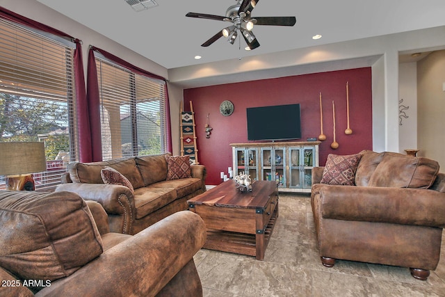 living room featuring ceiling fan