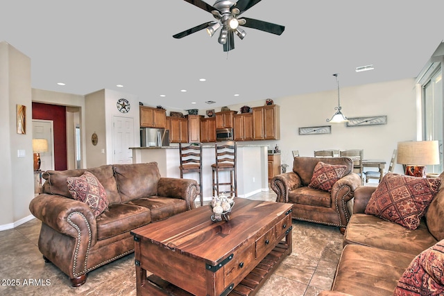 living room with ceiling fan