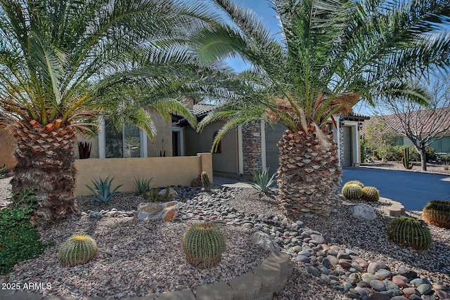 view of property exterior with a garage