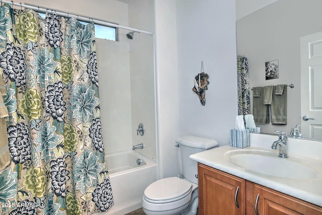 full bathroom featuring vanity, toilet, and shower / tub combo with curtain