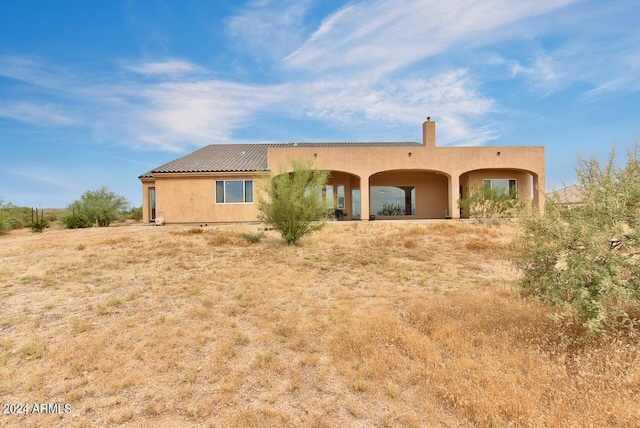 view of adobe home