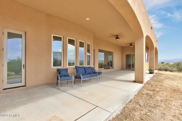 view of patio / terrace featuring ceiling fan and an outdoor hangout area