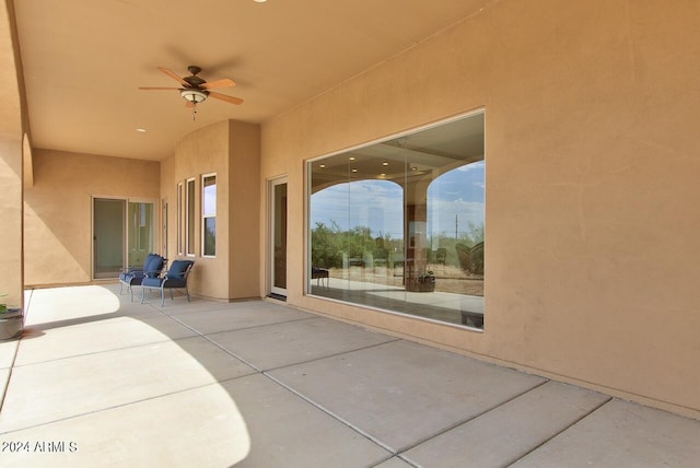 view of patio with ceiling fan