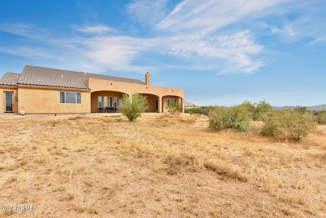 view of adobe home