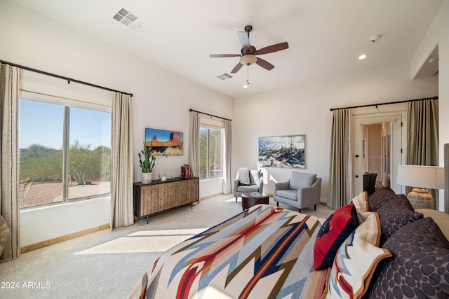 carpeted bedroom featuring ceiling fan