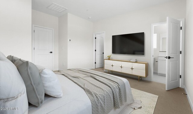 bedroom featuring light colored carpet, visible vents, and baseboards