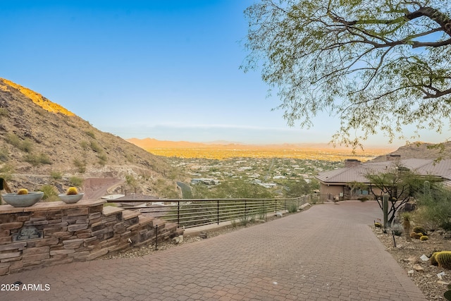 surrounding community featuring a mountain view