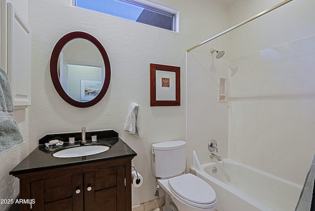 full bathroom with shower / bathing tub combination, plenty of natural light, toilet, and vanity