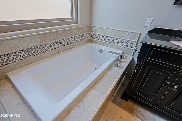 bathroom with a sink and a bath