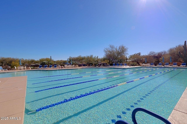 community pool featuring a patio area