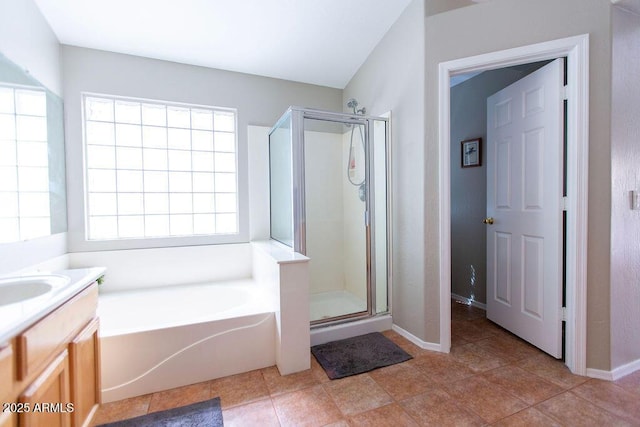 1894 E Sagebrush St, Gilbert, AZ 85296 - full bath featuring a shower stall, a bath, vanity, and baseboards