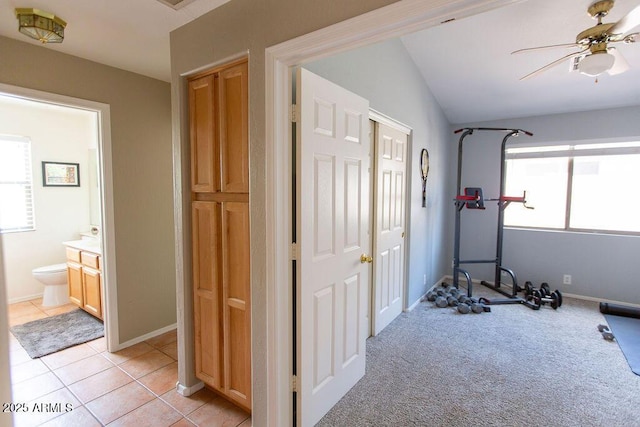 1894 E Sagebrush St, Gilbert, AZ 85296 - exercise area with ceiling fan, lofted ceiling, baseboards, and light tile patterned floors