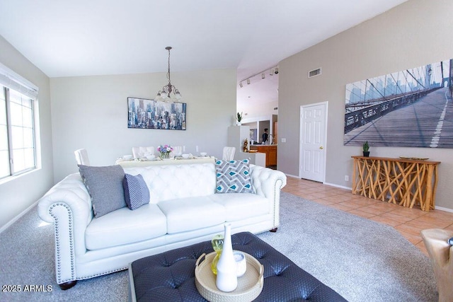 1894 E Sagebrush St, Gilbert, AZ 85296 - tiled living room featuring baseboards and a chandelier