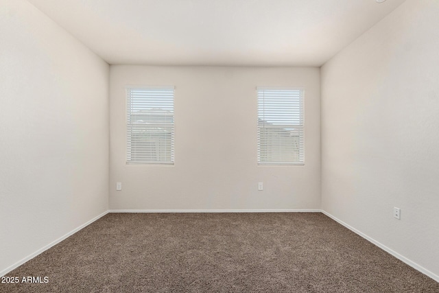 5240 E Gummite Dr, San Tan Valley, AZ 85143 - empty room with carpet floors, plenty of natural light, and baseboards