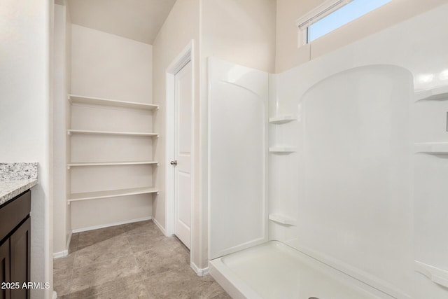 5240 E Gummite Dr, San Tan Valley, AZ 85143 - full bathroom featuring vanity, a shower, and baseboards