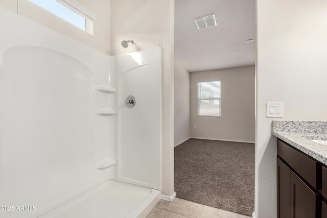5240 E Gummite Dr, San Tan Valley, AZ 85143 - full bath with healthy amount of natural light, a shower, vanity, and tile patterned flooring