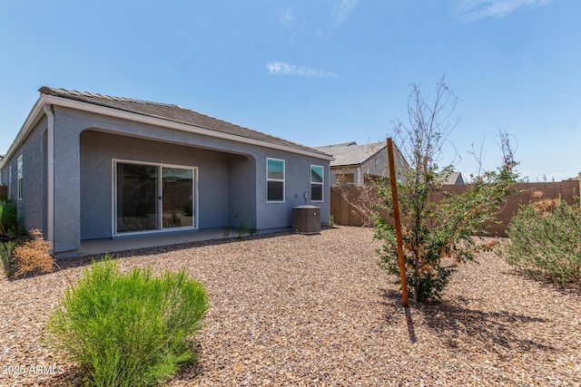 5240 E Gummite Dr, San Tan Valley, AZ 85143 - back of house with a fenced backyard, stucco siding, and cooling unit