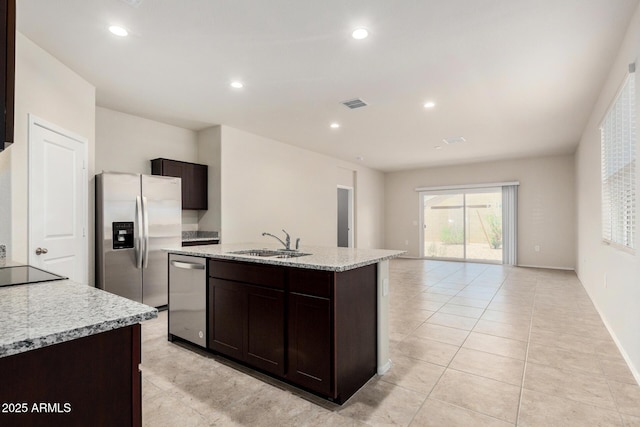 5240 E Gummite Dr, San Tan Valley, AZ 85143 - kitchen featuring appliances with stainless steel finishes, a sink, dark brown cabinetry, a center island with sink, and recessed lighting