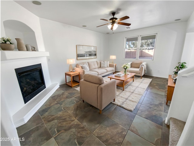 living room with ceiling fan