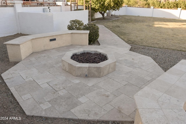 view of patio featuring a fire pit