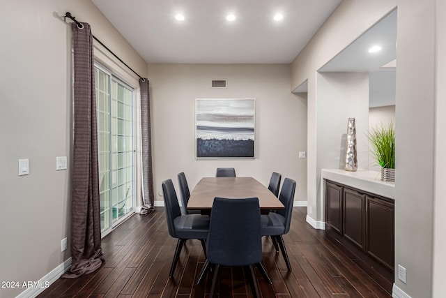 dining room featuring dark wood-type flooring