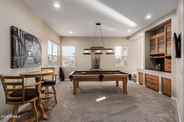 game room with billiards, a wealth of natural light, and carpet floors