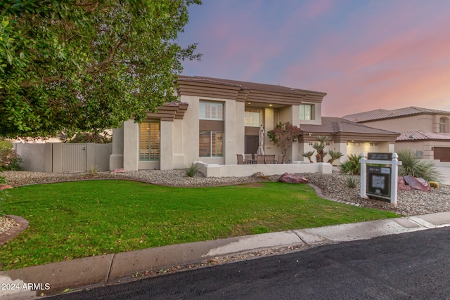 view of front of home featuring a yard