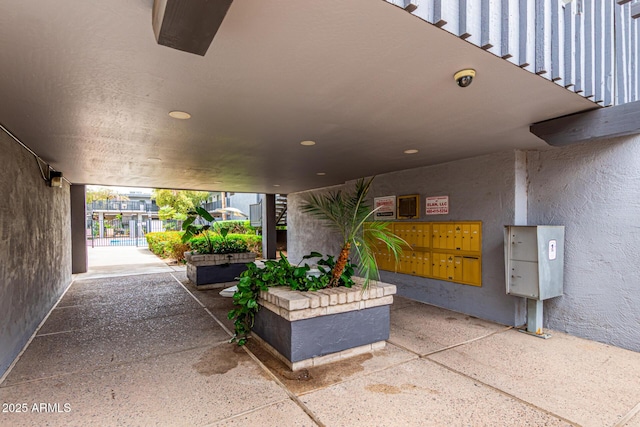 view of patio / terrace with mail area