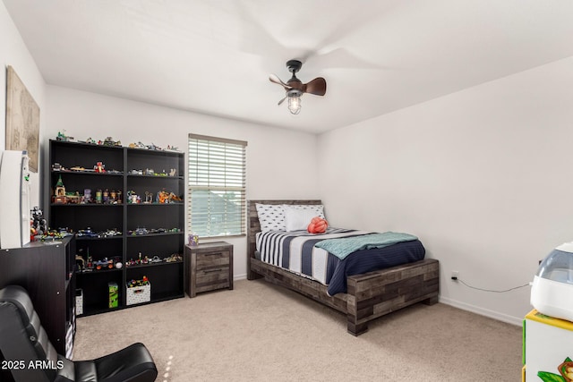 bedroom featuring carpet flooring, ceiling fan, and baseboards