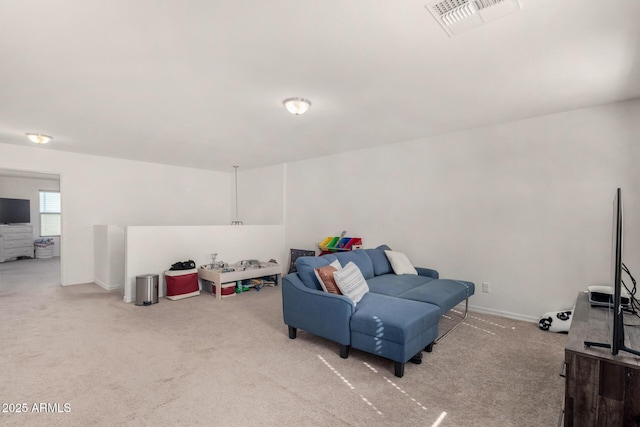 interior space featuring carpet, visible vents, and baseboards