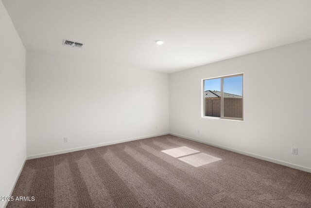 4051 N Ghost Hollow Way, Casa Grande, AZ 85122 - carpeted empty room featuring visible vents and baseboards