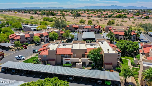 drone / aerial view with a mountain view and a residential view