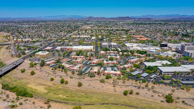 drone / aerial view featuring a mountain view