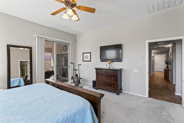10333 E Gold Nugget Ct, Gold Canyon, AZ 85118 - carpeted bedroom featuring baseboards, a ceiling fan, and access to outside