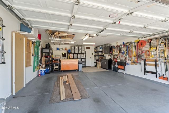 10333 E Gold Nugget Ct, Gold Canyon, AZ 85118 - garage featuring a workshop area
