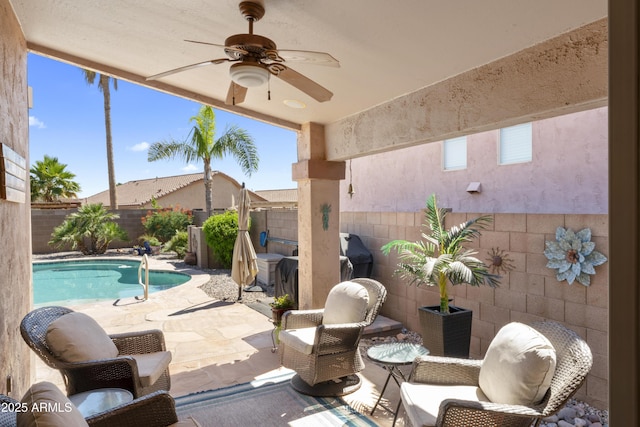 10333 E Gold Nugget Ct, Gold Canyon, AZ 85118 - fenced backyard with ceiling fan and a patio