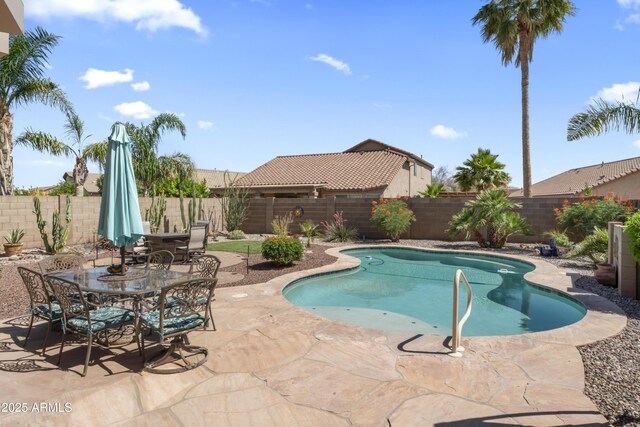 10333 E Gold Nugget Ct, Gold Canyon, AZ 85118 - view of pool featuring a patio area, a fenced backyard, and outdoor dining space