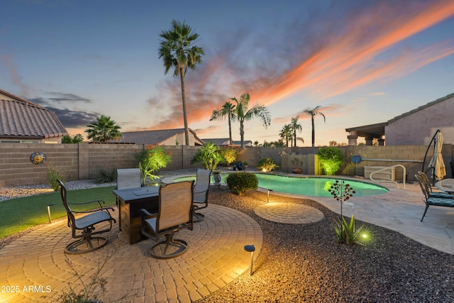 10333 E Gold Nugget Ct, Gold Canyon, AZ 85118 - view of pool featuring a patio area, a fenced backyard, and outdoor dining area