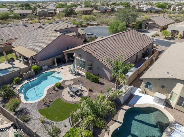10333 E Gold Nugget Ct, Gold Canyon, AZ 85118 - aerial perspective of suburban area with a pool