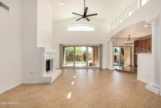 2226 N Gentry, Mesa, AZ 85213 - unfurnished living room featuring high vaulted ceiling, decorative columns, light tile patterned floors, a ceiling fan, and arched walkways