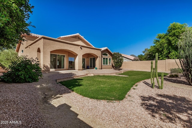 2226 N Gentry, Mesa, AZ 85213 - back of house with stucco siding, a tile roof, and a patio area