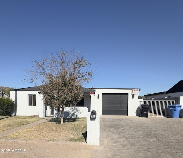 view of front of property featuring a garage