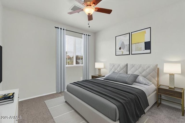 1811 S 39th St Unit 30, Mesa, AZ 85206 - bedroom with light colored carpet, baseboards, and a ceiling fan