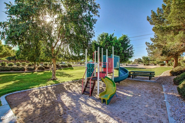 view of jungle gym with a yard