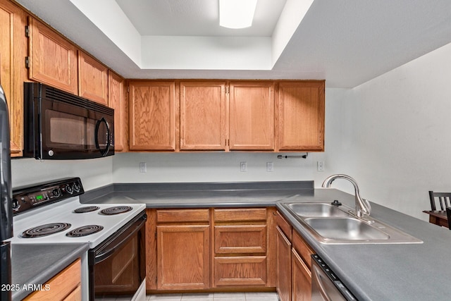 609 E Mesquite Cir Unit D133, Tempe, AZ 85288 - kitchen featuring electric range, black microwave, brown cabinetry, and dishwasher