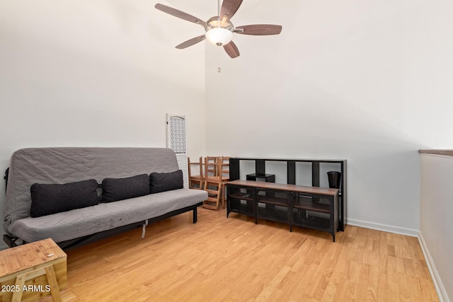 609 E Mesquite Cir Unit D133, Tempe, AZ 85288 - living area featuring light wood-type flooring, a towering ceiling, and a ceiling fan